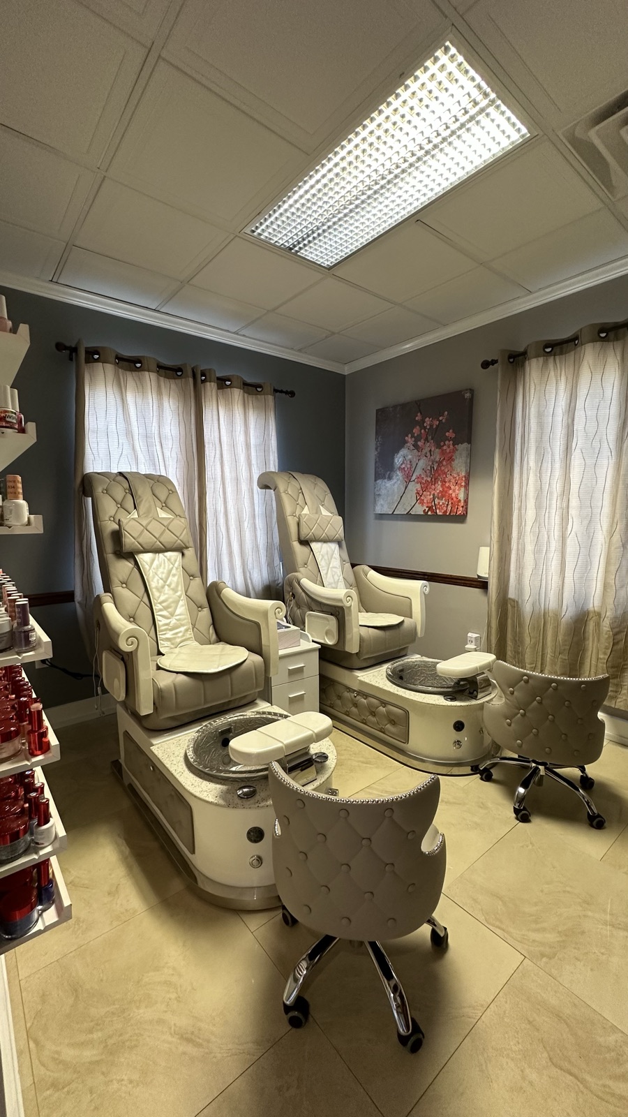 Private VIP pedicure room with cherry blossom artwork